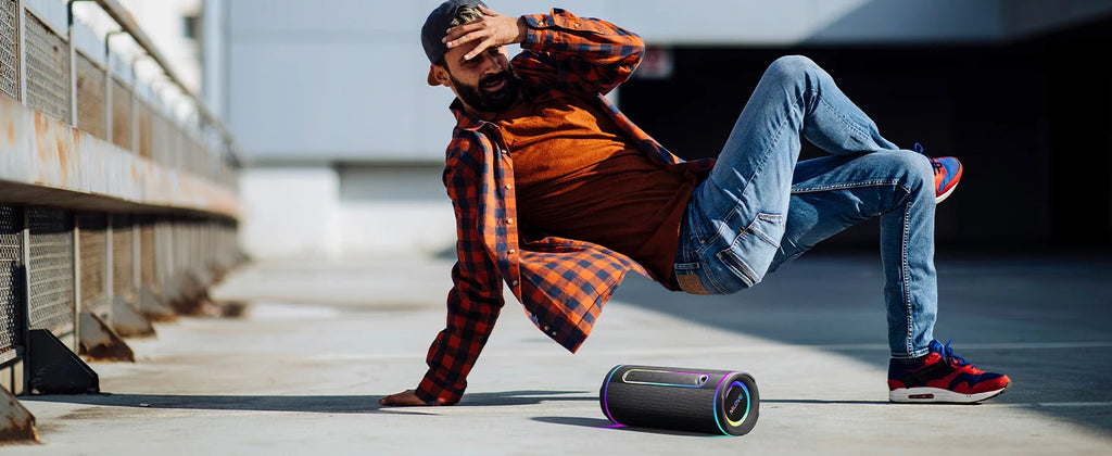 MLOVE E80 Portable Bluetooth Speaker – Powerful Dual Sound, Colorful RGB Lighting, Fully Waterproof (IPX7), TWS Enabled