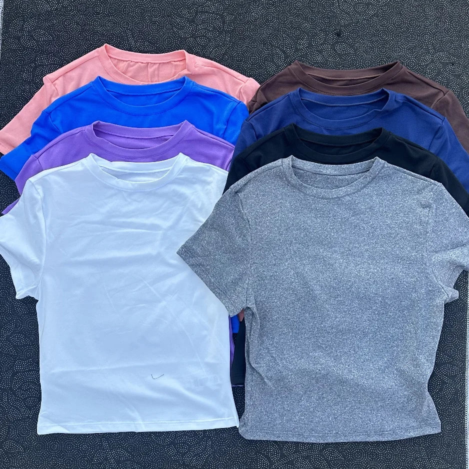 Solid color women's soft breathable yoga short-sleeved comprehensive training tight T-shirt with exposed belly button fitness sh Main image